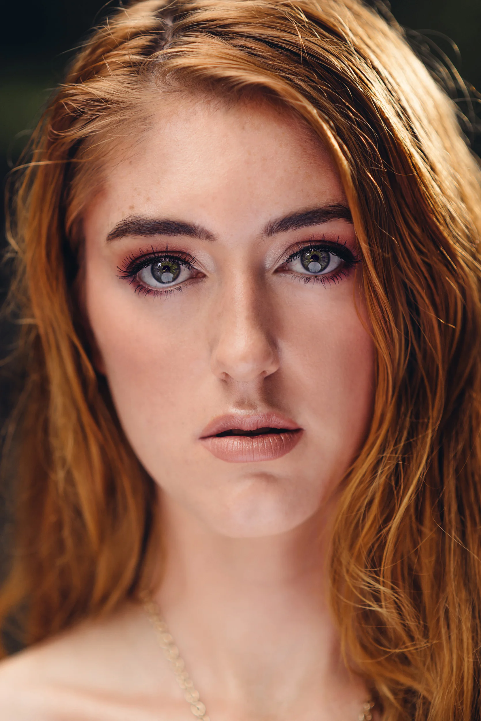 Beautiful peachy and gold makeup portrait by Sarah Hooker Photography