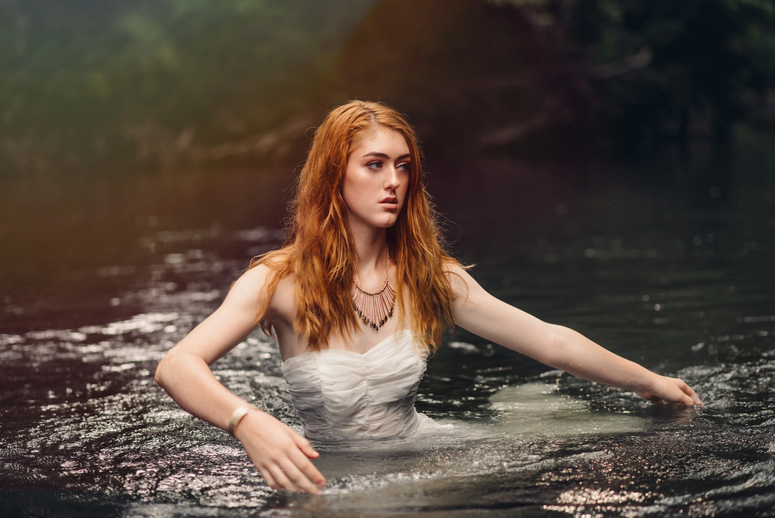 White vintage dress in the water by Sarah Hooker Photography