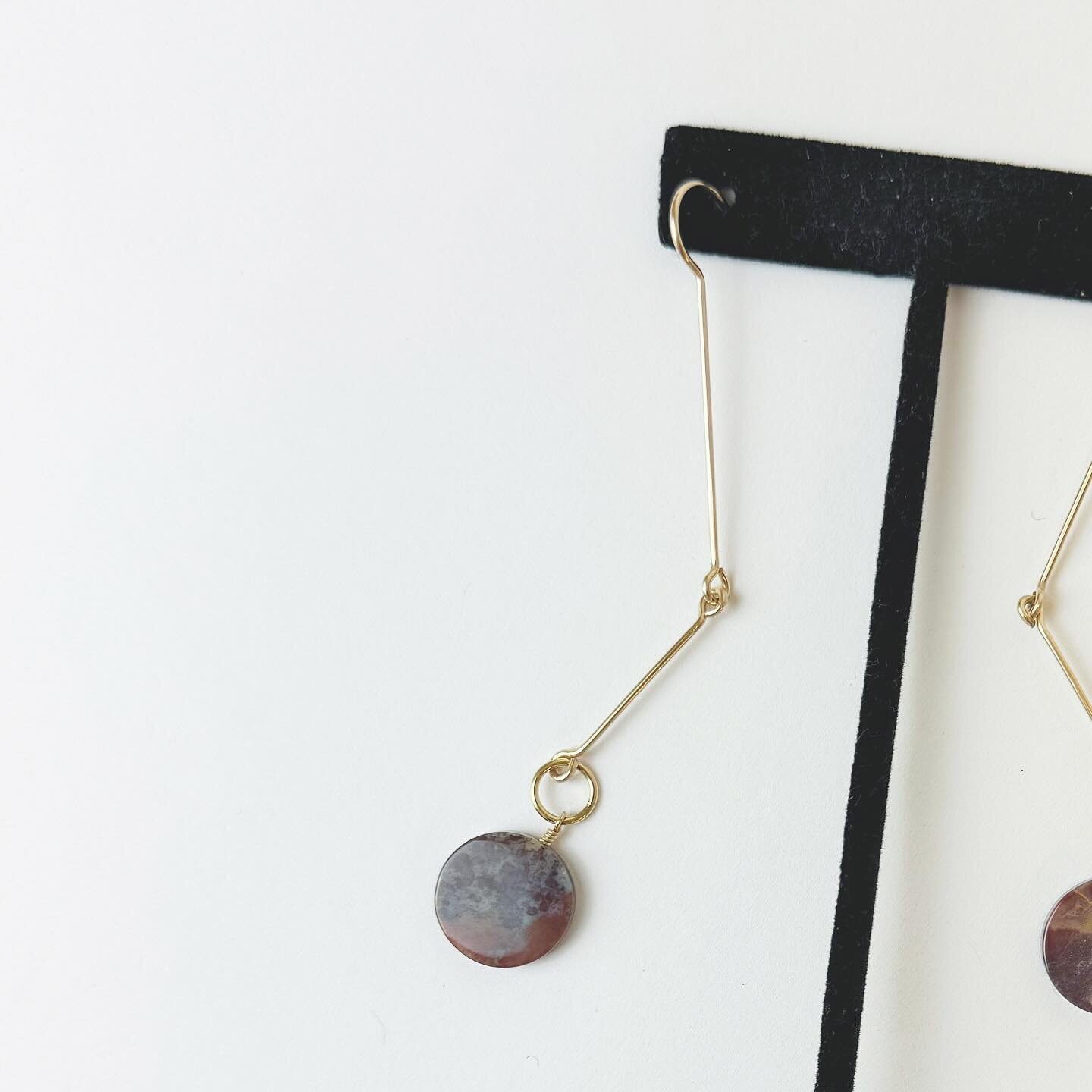 The Mantis Earrings, an elongated play of gold with gently weight punctuation of jasper. 

Details available upon request.