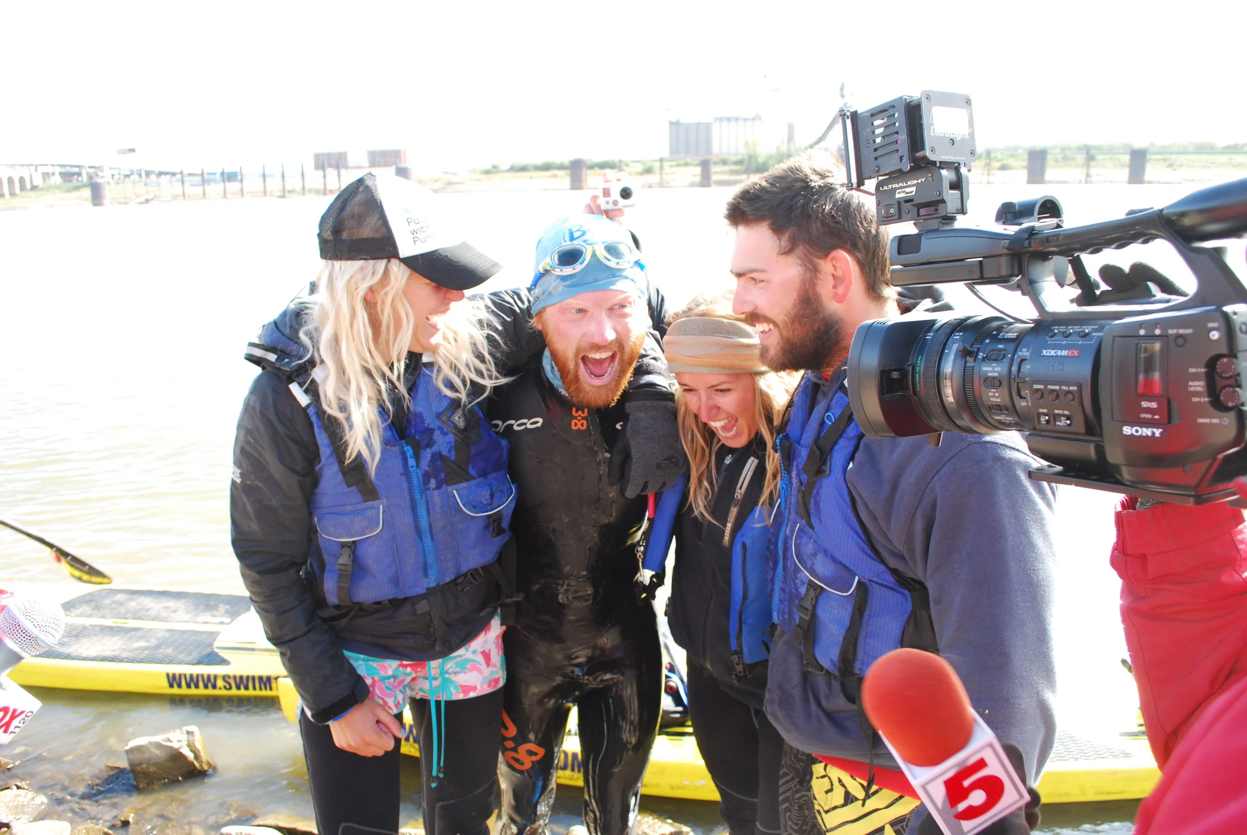 With my crew upon finishing a 1001 mile swim in St Louis, Missouri. October 2012 From left to right: Ness Knight, Emily Bell and Ben Stiff