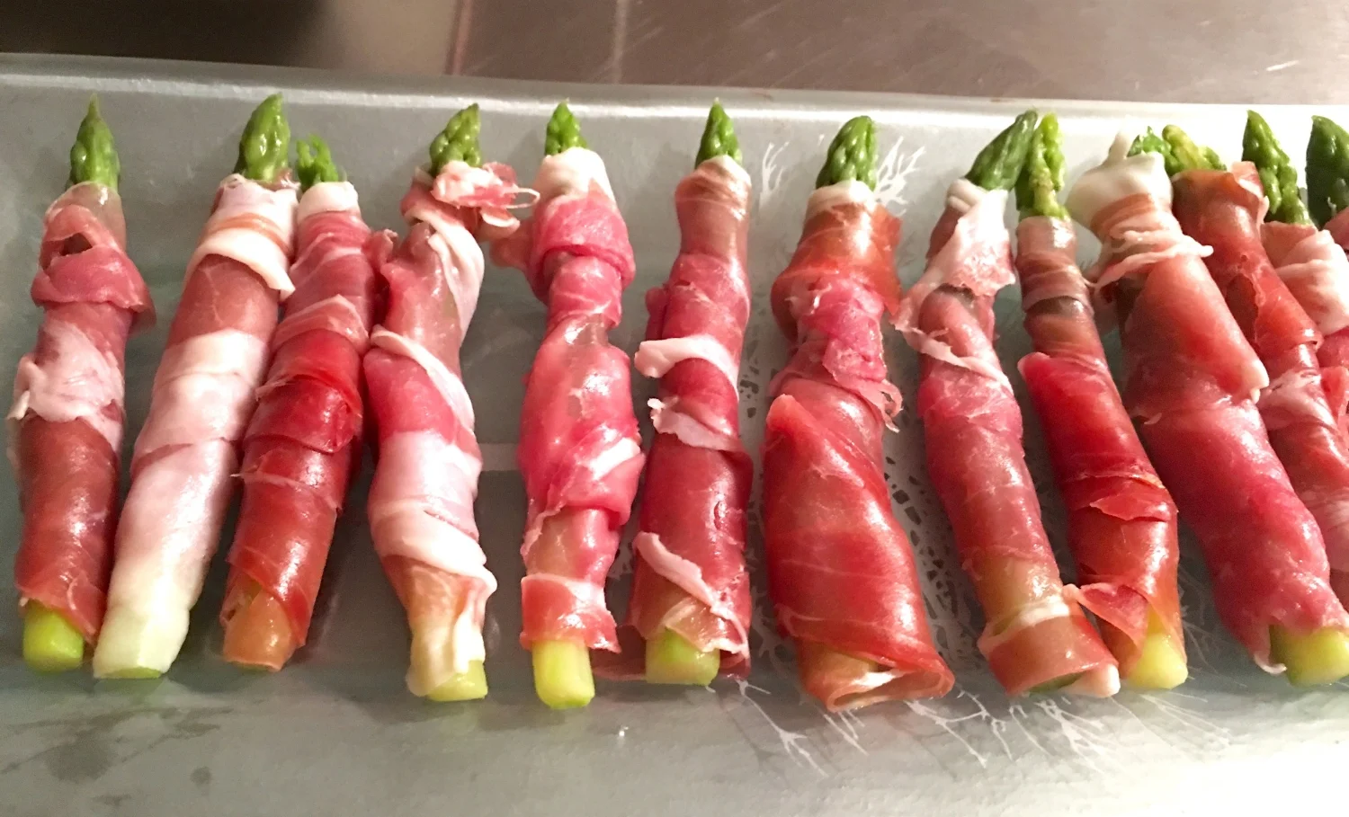 This wonderful combination of prosciutto and asparagus can be prepped a day in advance. 