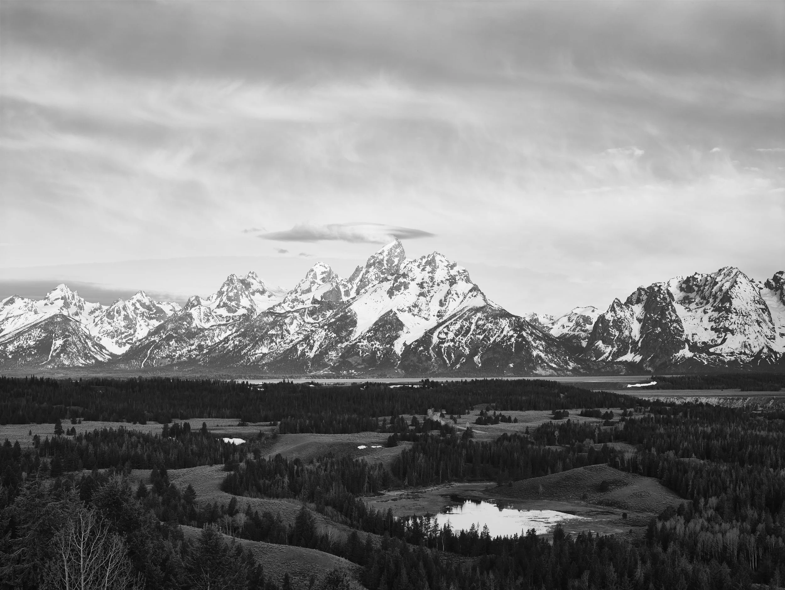 Even after being converted to black & white with some light post-processing, this image still fails "the squint test." This image needs a grad filter.