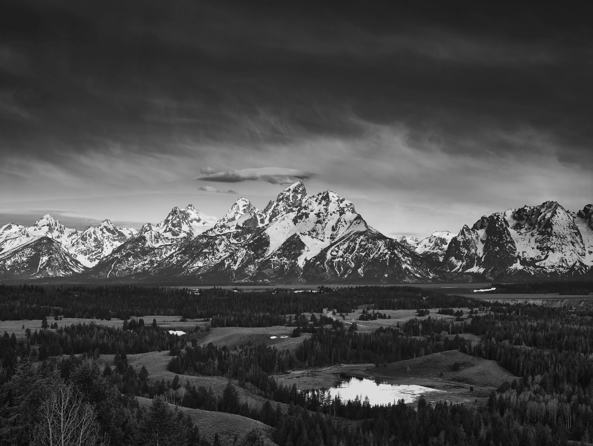 The 3-stop ND filter balances the luminosity of the sky to the terrain almost perfectly and draws the viewer's eye to the mountain range.