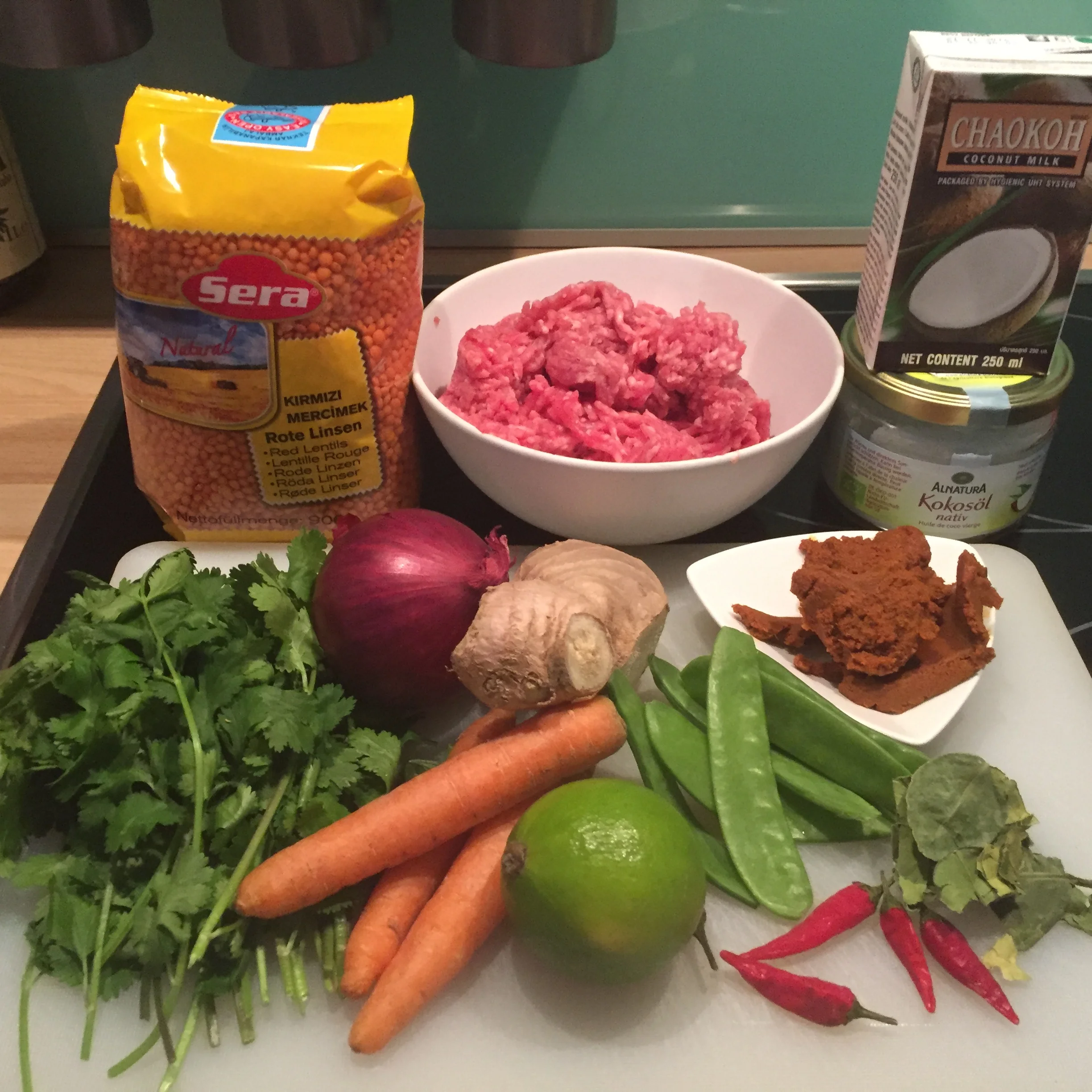 Yellow Curry & Coconut Lentil-Soup with spicy Cilantro-Meatballs