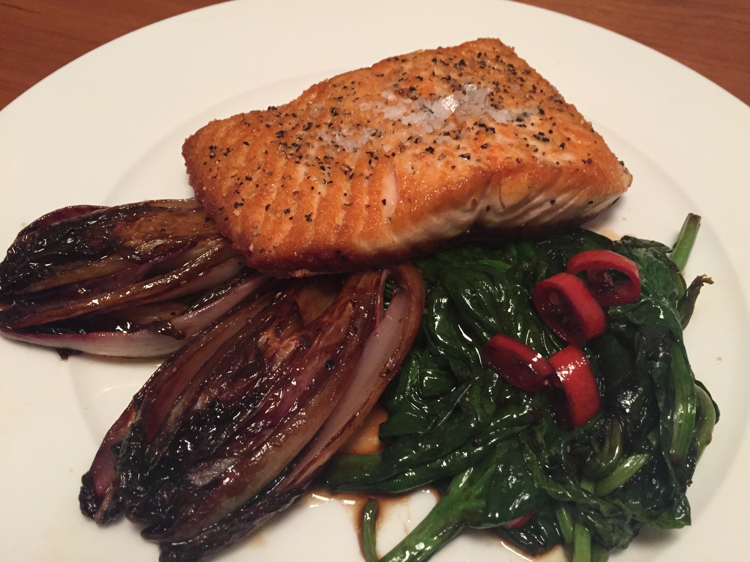 Salmon with caramelized Radicchio and spicy Spinach