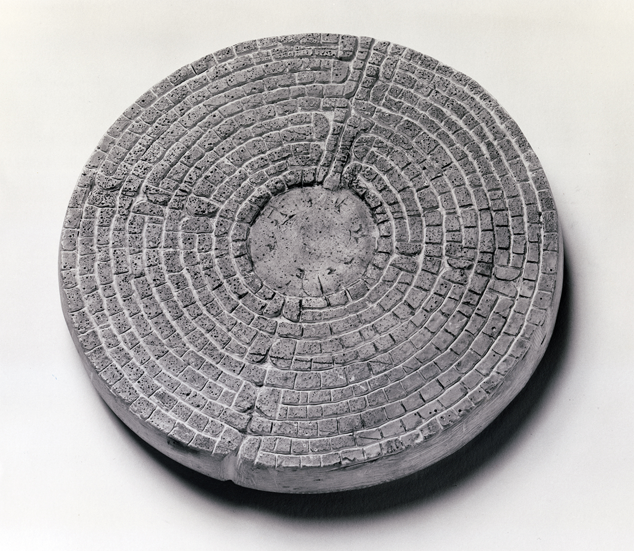 Terry Fox: Plaster Labyrinth , from Works from the Labyrinth , 1971–78; plaster; 7 ½-inch diameter; University of California, Berkeley Art Museum and Pacific Film Archive; purchased with the aid of funds provided by the National Endowment for the