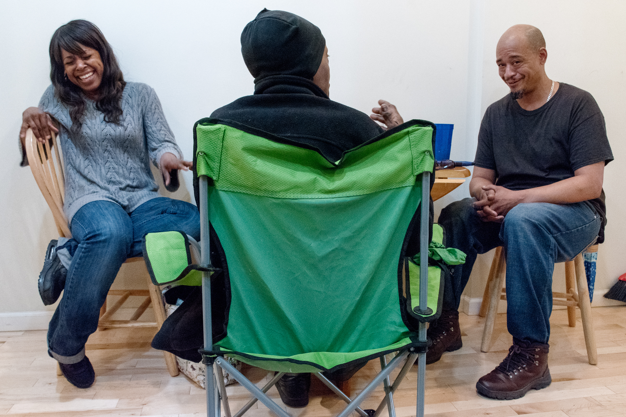 May 5, 2017- Brooklyn, N.Y., U.S.A.- Frankie spends time with his neighbour Anthony Hampton and his caregiver Aurelia Pinkard in Anthony's home.