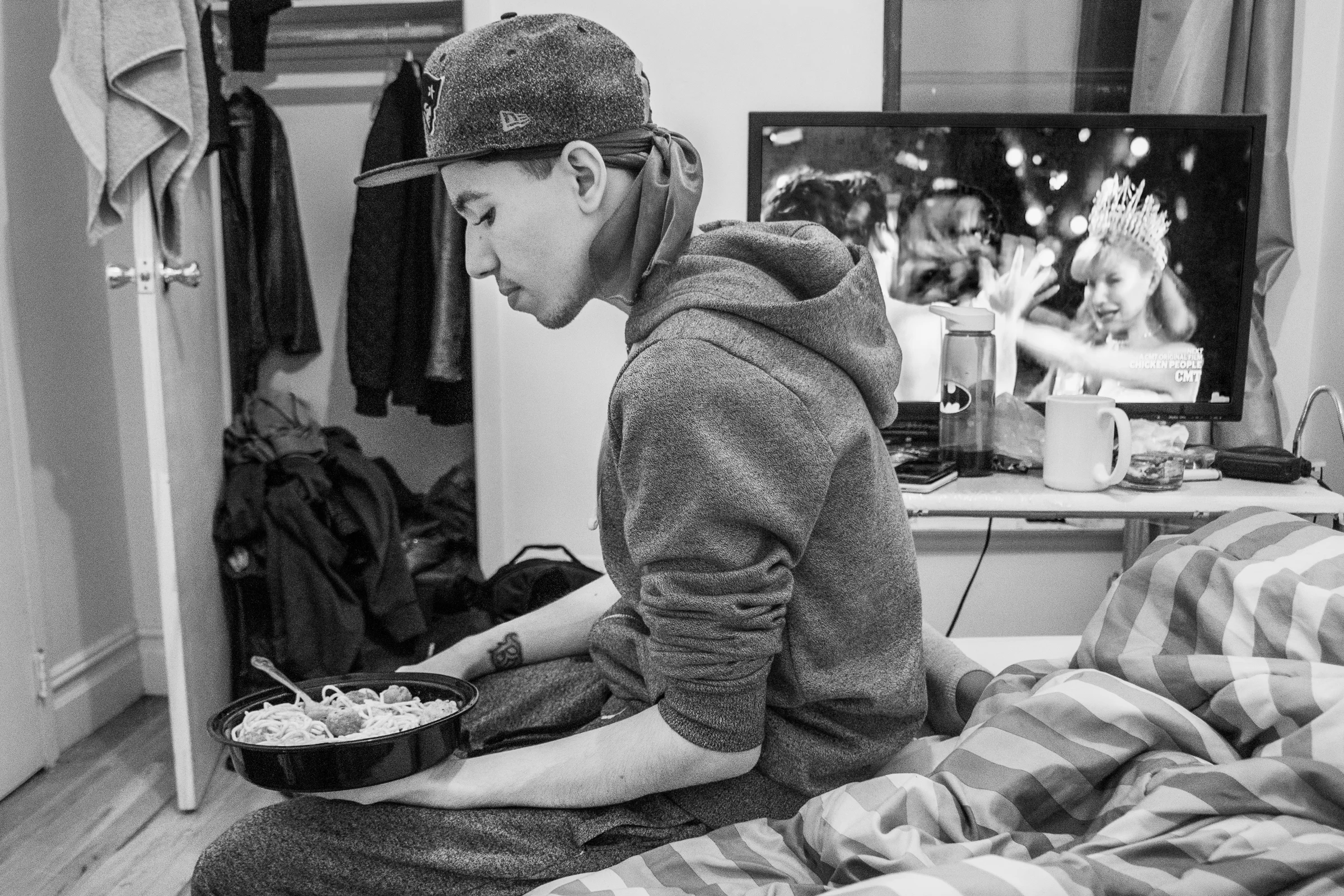 Nov 24, 2016- Crown Heights, Brooklyn, N.Y., U.S.A. -Bronson hangs out in his foster home bedroom with his girlfriend Latavia on his night off work. He is unable to go out because his paycheck is late.