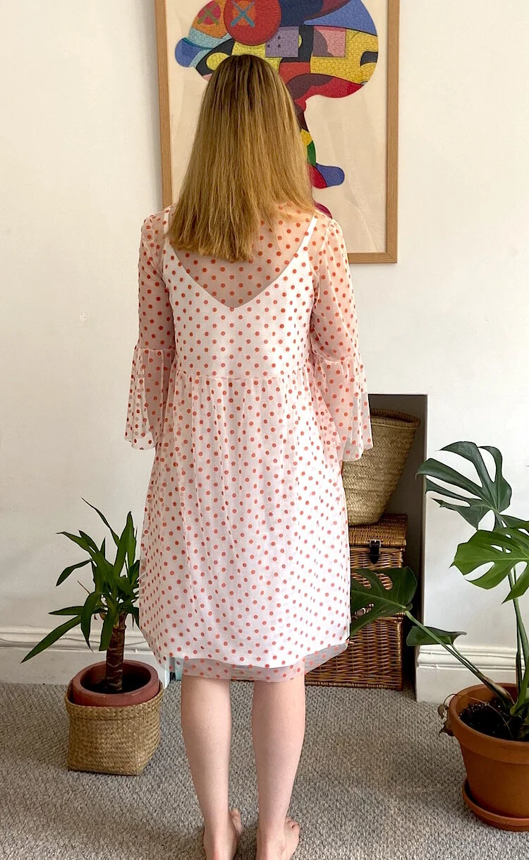 Both dresses back.jpeg