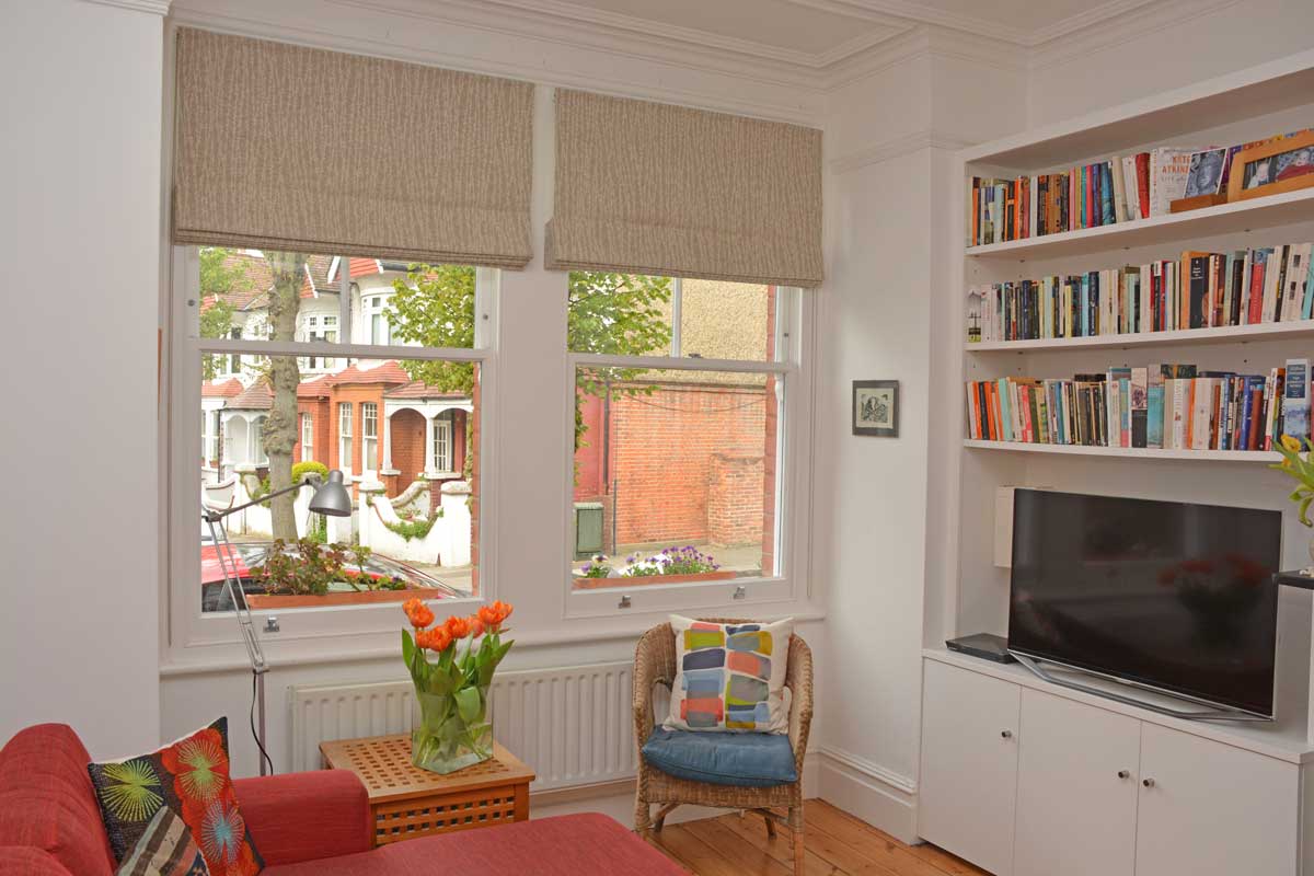 Double roman blind in a stone-grey fabric