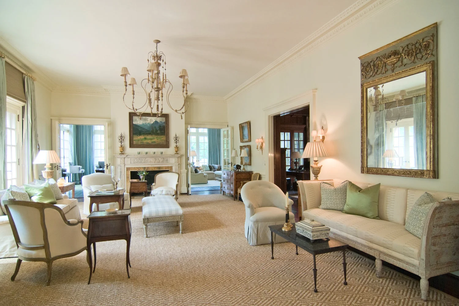Communal area photographed with layers showing a clear foreground, middle ground, and background. All curtains are open.