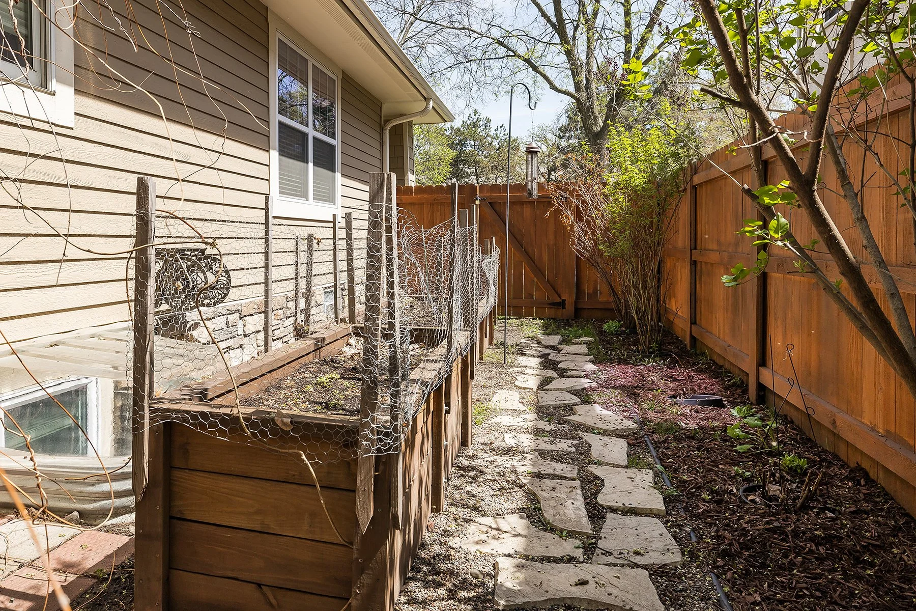 web_raised beds and stone path.jpg