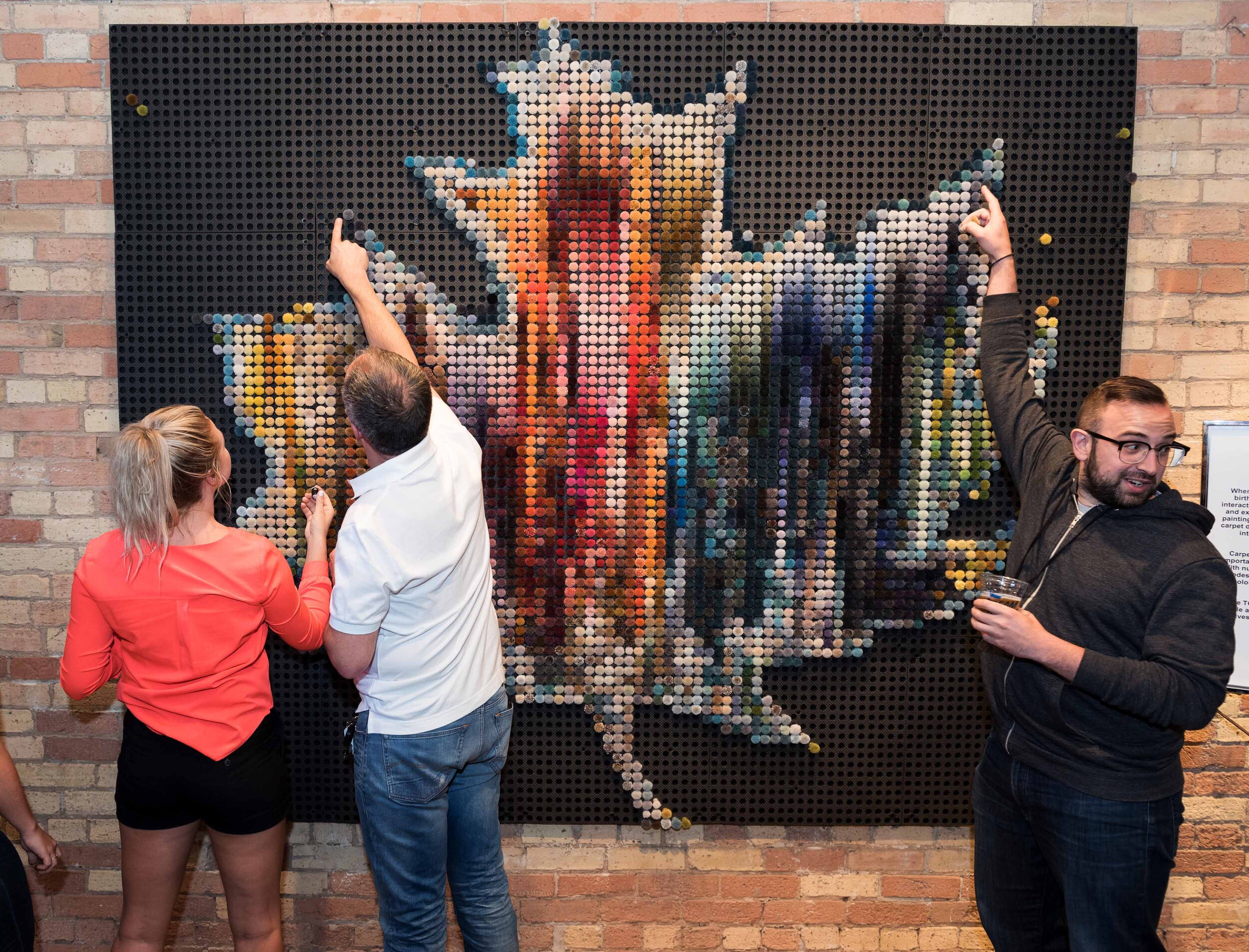  Guests were invited to interact with the colourful installation. ( Learn more about Pom Mosaics™ ) 