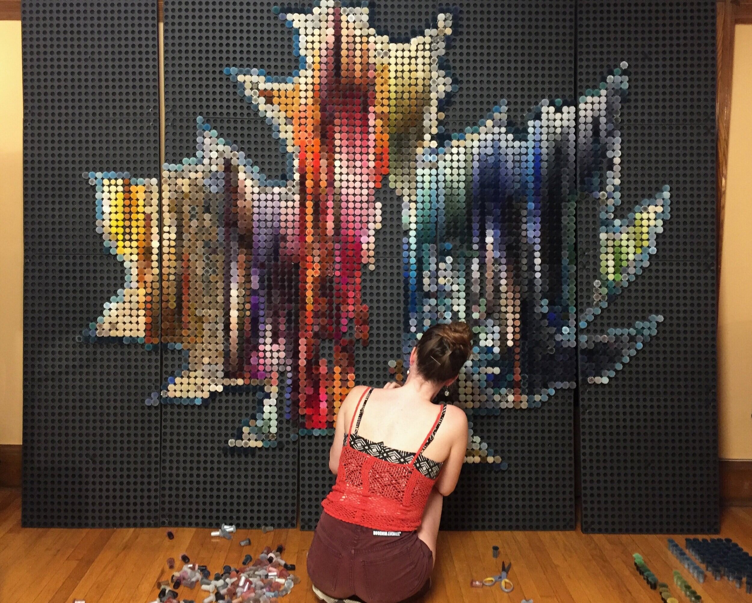  Robyn working on the “Canada Leaf” Pom Mosaic™ in her studio.  