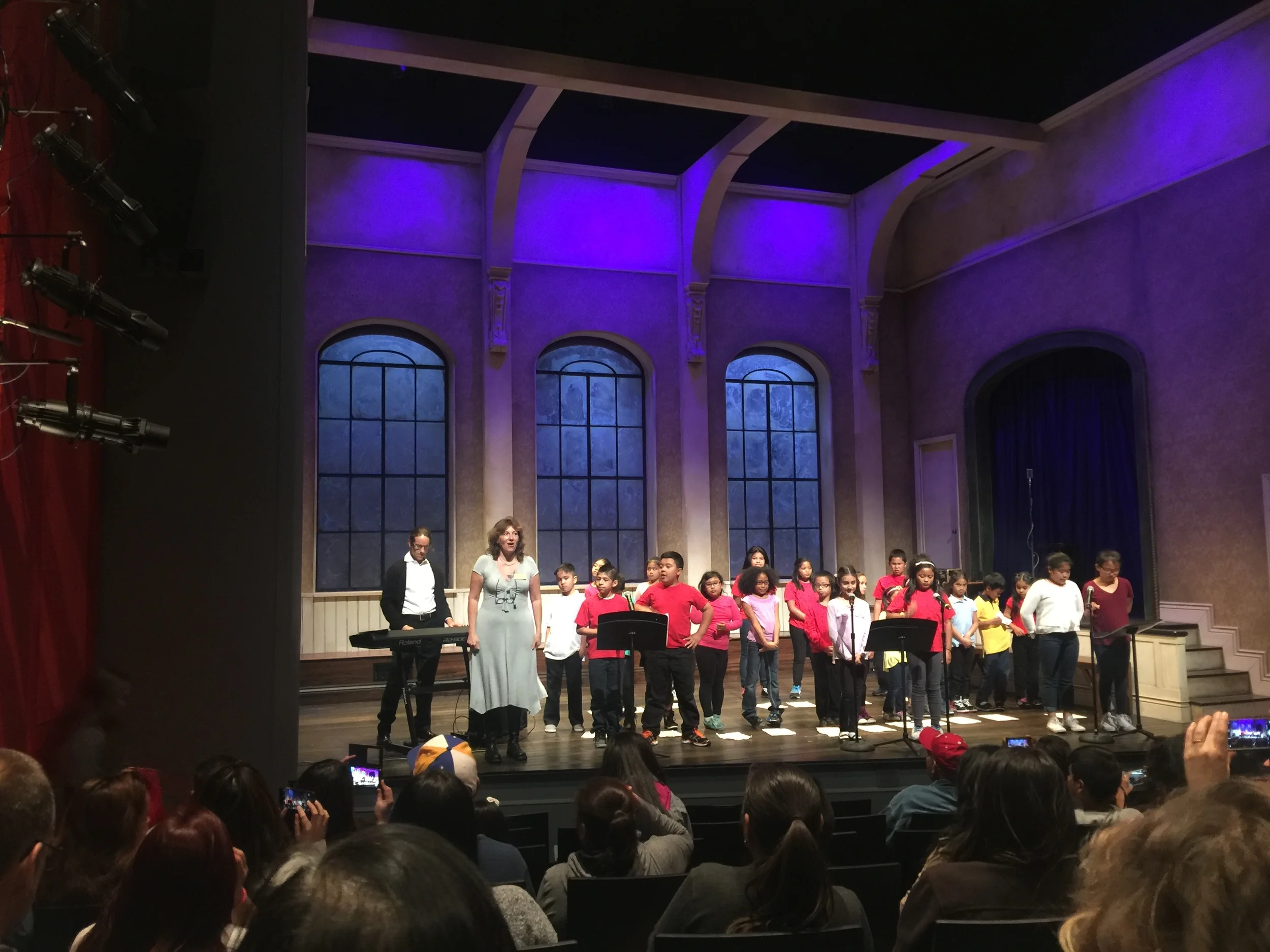 Fourth and Fifth Graders from the Bessie Carmichael Elementary School perform their teacher Peter Sroka's composition about Philippines history at the American Conservatory Theater's Strand Theater. Sroka is performing on the keyboard on the left. Image: Sarah Lai Stirland