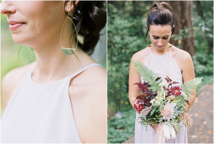  Bridesmaid in blush dress, gold handmade earrings holding bouquet. 
