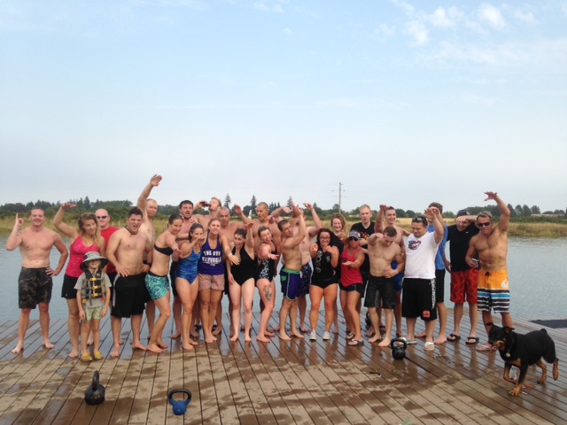 Part of the Swim WOD crew showing their best land swimming form!