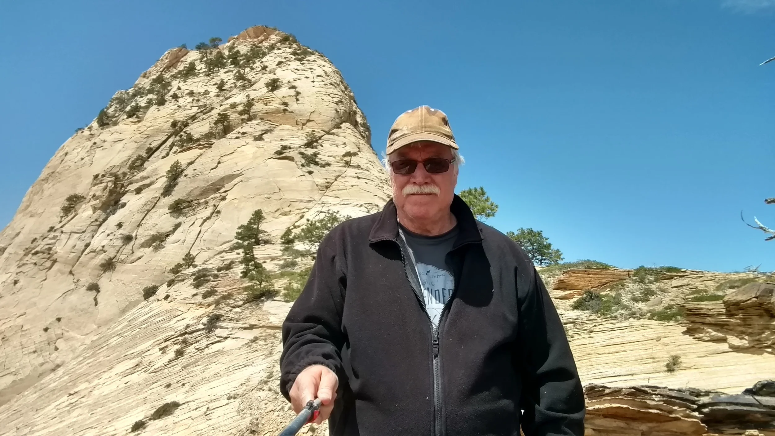Selfie showing the North Guardian class 4 scramble route to summit