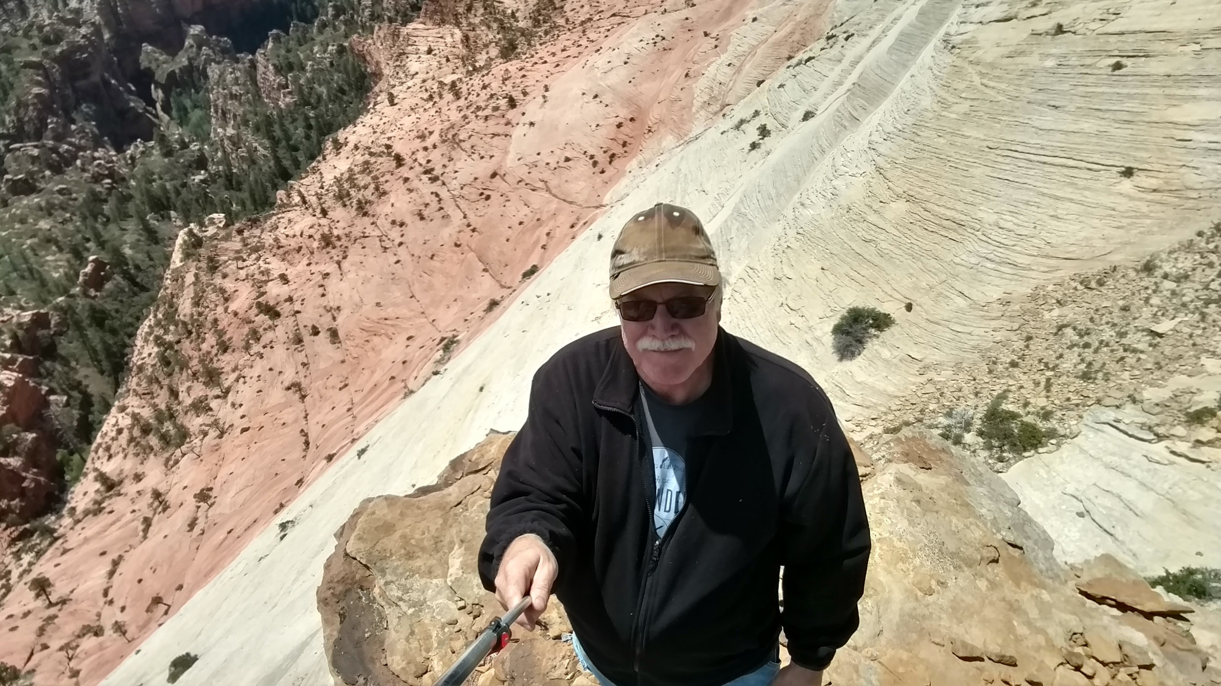 Selfie showing the rocky outcropping and dramatic drop off to the Subway.