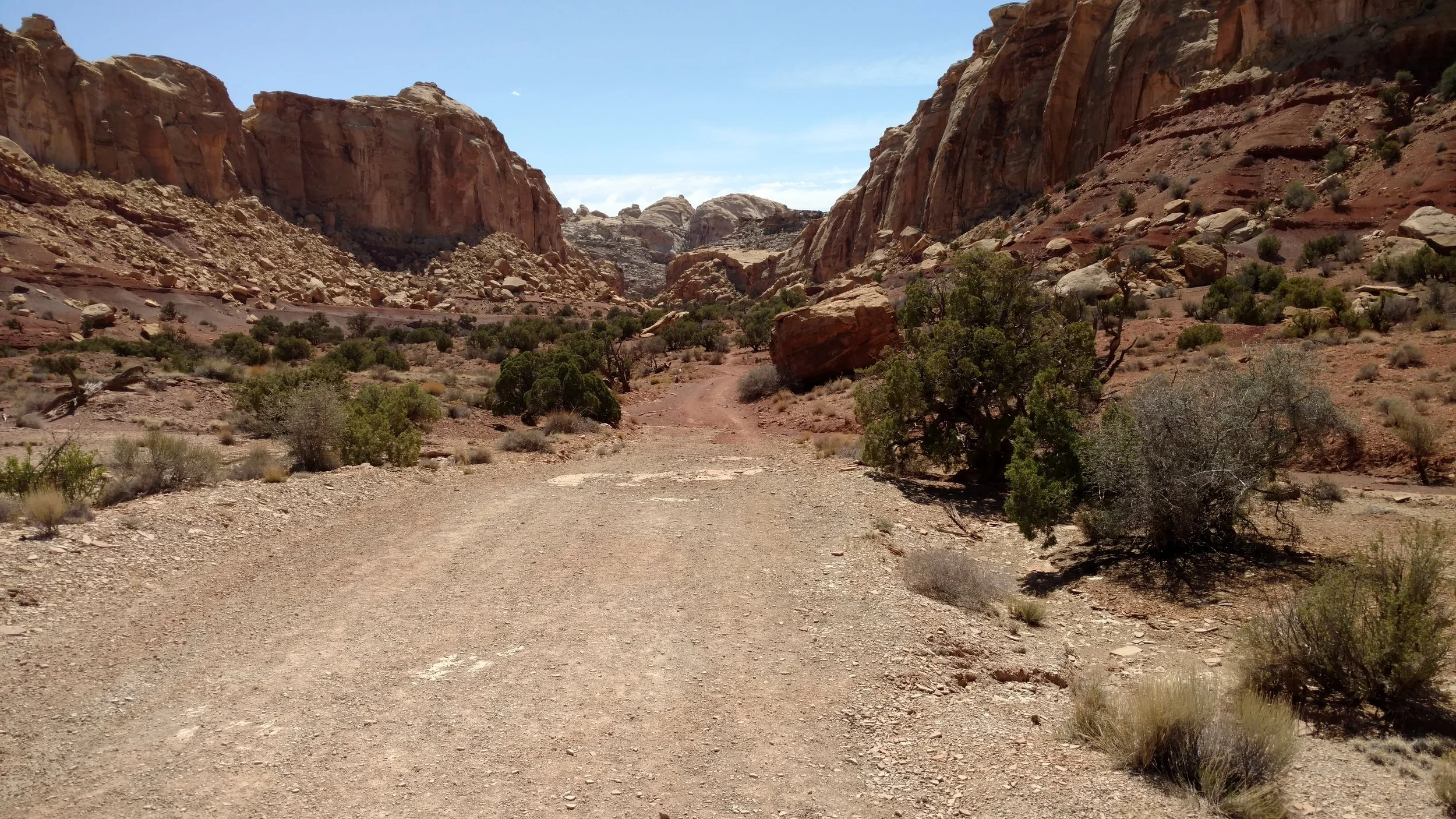 Road hiking toward Little Wild Horse Canyon