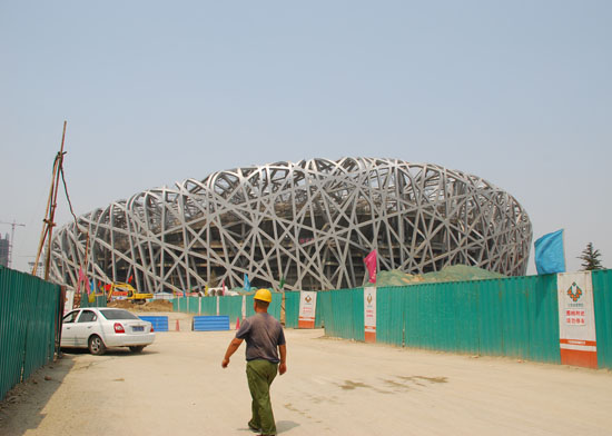 This is as close as I could get to the stadium. I tried to just act important and walk in. When I was stopped, I flashed my Student ID to the Chinese security guard and said Arup (the structural engineers of the building) but that didn't work. After that, I flashed 100 Yuan bills in the face of every security guard but that also didn't work. Some of my friends are still there and if they get in I will post some of their photos.