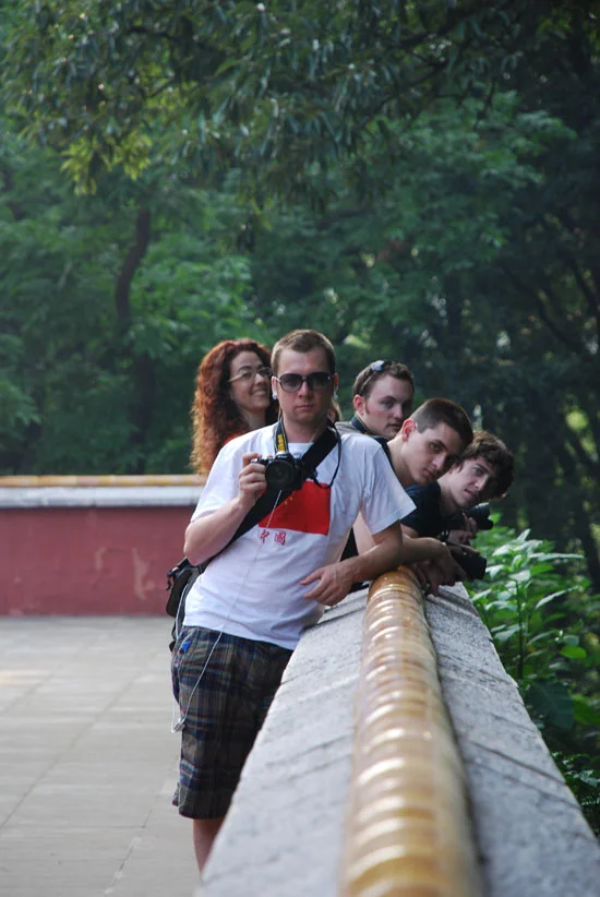 Us looking toward the man-made mountain under which somewhere the first Ming emperor is buried.