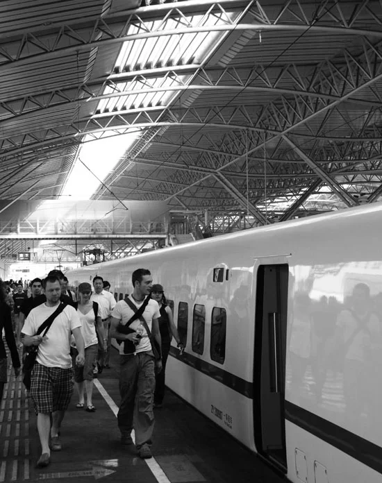 Train station from Nanjing to Shanghai. I didn't get to ride the electromagnetic train that goes like 450 mph, but this one was nice. Wait, no it wasn't. The only beer they had was warm Budweiser in faceted cans. And they only had 18 of those for a train of several hundred. My friends and I drank the train dry in about 4 minutes.