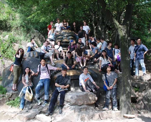 The obligatory group photo sitting on a giant Buddha. I rubbed his belly for good luck and then immediately Purel-ed my hands for good health. I'm top right in the white T.