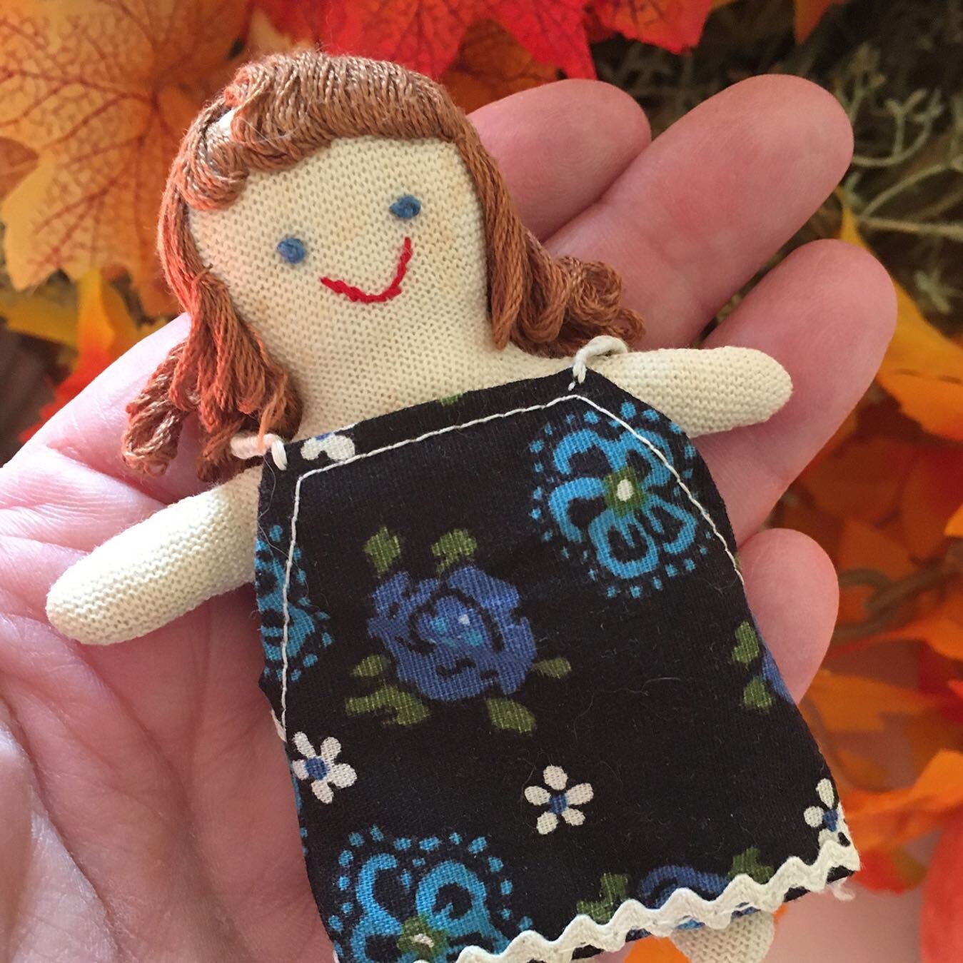 A lovely little lady I recently rediscovered, stashed away with some other childhood treasures. 

Mom made these for us, my older sister and I, when we were kids, using our old cotton anklets and fabric left over from the dresses she sewed for us. 

