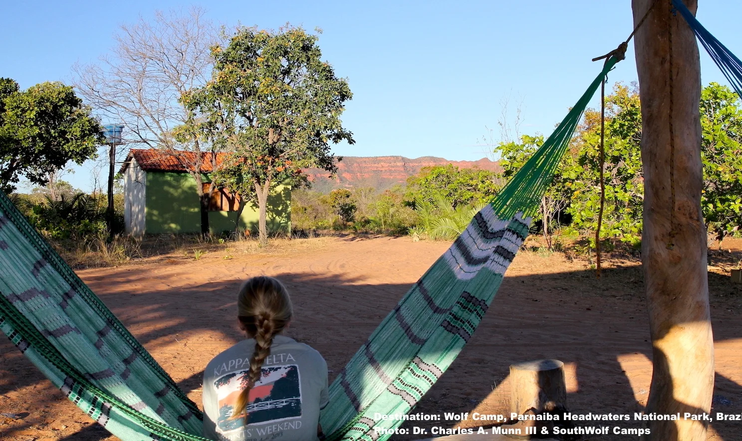 RELAXING AT WOLF CLIFF CAMP. HERE YOU CAN DRINK IN BRAZIL'S CERRADO, AN ANCIENT AND BIODIVERSE ECOSYSTEM COMPRISED OF GRASSLAND SAVANNA, WOODLAND SAVANNA, and dry FOREST AND THE UNIQUE SPECIES FOUND HERE. IMAGE: ©DR. CHARLES A. MUNN AND SOUTHWILD, BRAZIL.