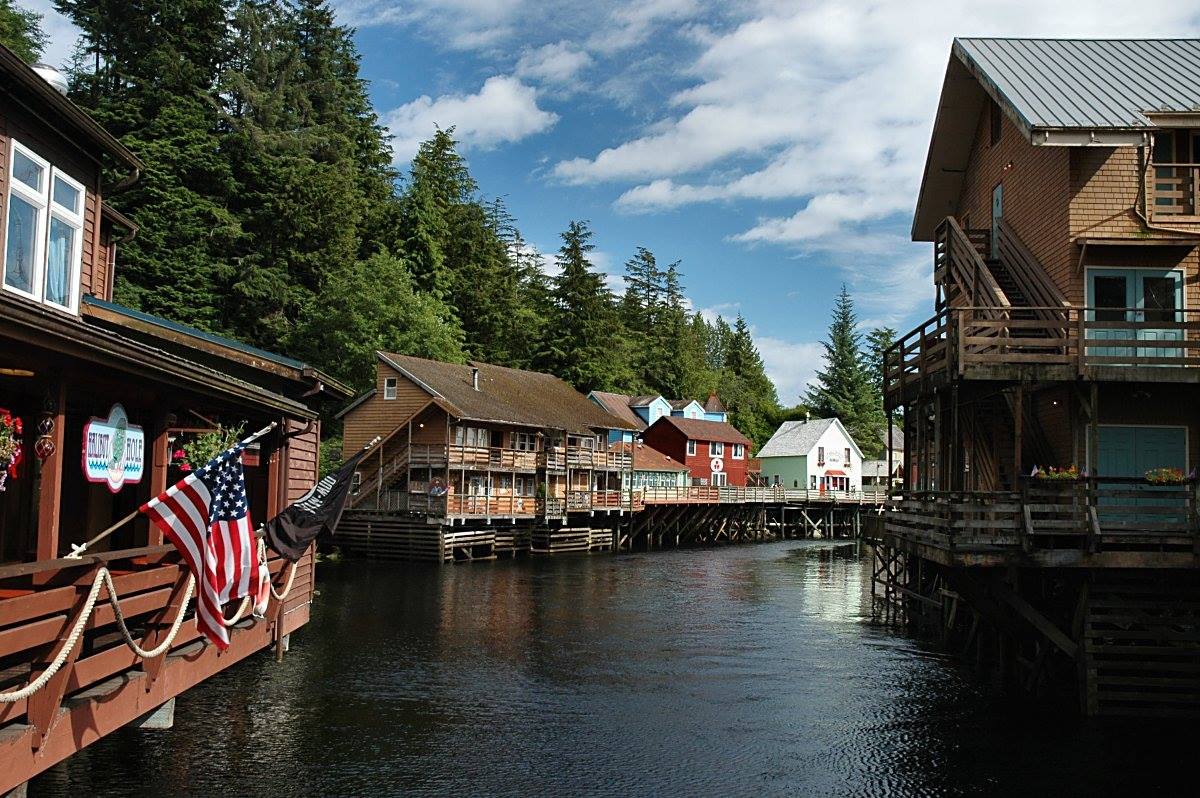 KETCHIKAN IS YOUR STARTING POINT. TAKE A SMALL PLANE OR CATCH THE FERRY TO PRINCE OF WALES ISLAND, BUT BEFORE YOU DO EXPLORE THIS COLORFUL, FRIENDLY AND FASCINATING PLACE. CREEK STREET, KETCHIKAN, ALASKA. IMAGE: THE ALASKA FACEBOOK PAGE.