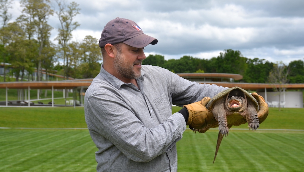 NATURE EDUCATIONAL PROGRAMS ARE PART OF THE FUN AT GRACE FARMS, NEW CANAAN, CT. HERE MARK FOWER, NATURE INITIATIVE DIRECTOR, EXPLAINS THE WAYS OF A TURTLE. IMAGE: THANKS TO THE GRACE FARMS FOUNDATION.