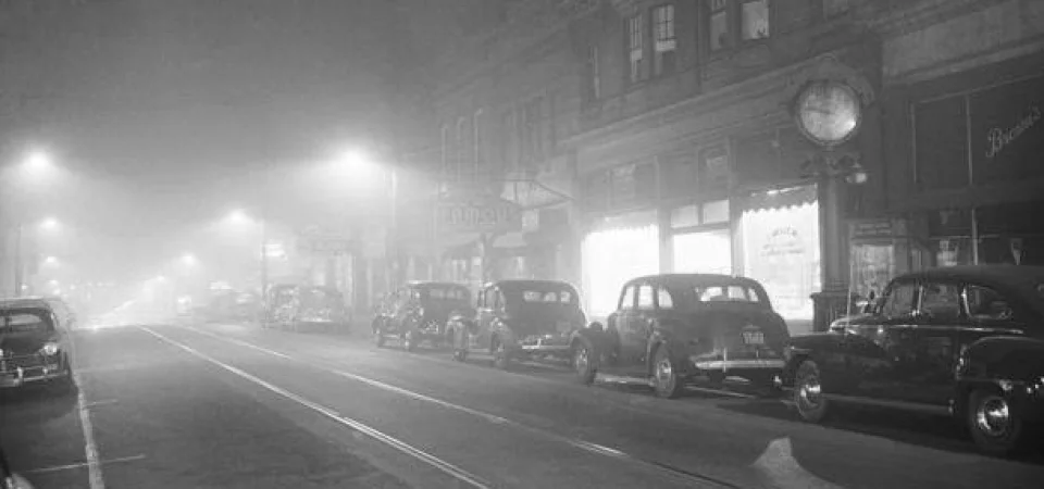 NOON TIME IN DONORA IN OCTOBER 1948. THE SMOG MADE IT SO DARK THAT STREET LIGHTS WERE NECESSARY. 20 PEOPLE DIED AND 40% OF THE 14,000 RESIDENTS WERE SICKENED. THE DONORA TRAGEDY WAS THE BEGINNING OF CLEAN AIR LEGISLATION IN THE UNITED STATES. IMAGE: CALU ARCHIVES AND TIM KOVACH.