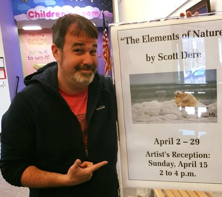 SCOTT DERE, FOUNER OF ELEMENTS OF NATURE AT AN EXHIBIT OF HIS WORK THIS PAST SPRING.