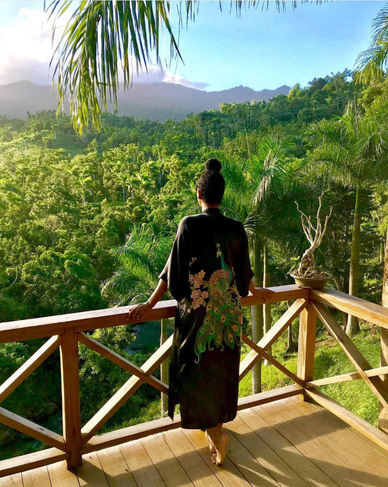 A GUEST ABSORBING THE LIGHT AND SERENITY OF YUQUYU. IMAGE COURTESTY OF D. ANDERSON PHOTOGRAPHY Dorian Anderson