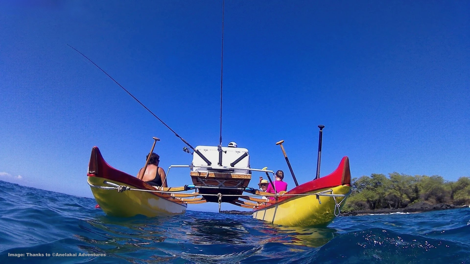 Heading out on a traditional doubled-hulled canoe