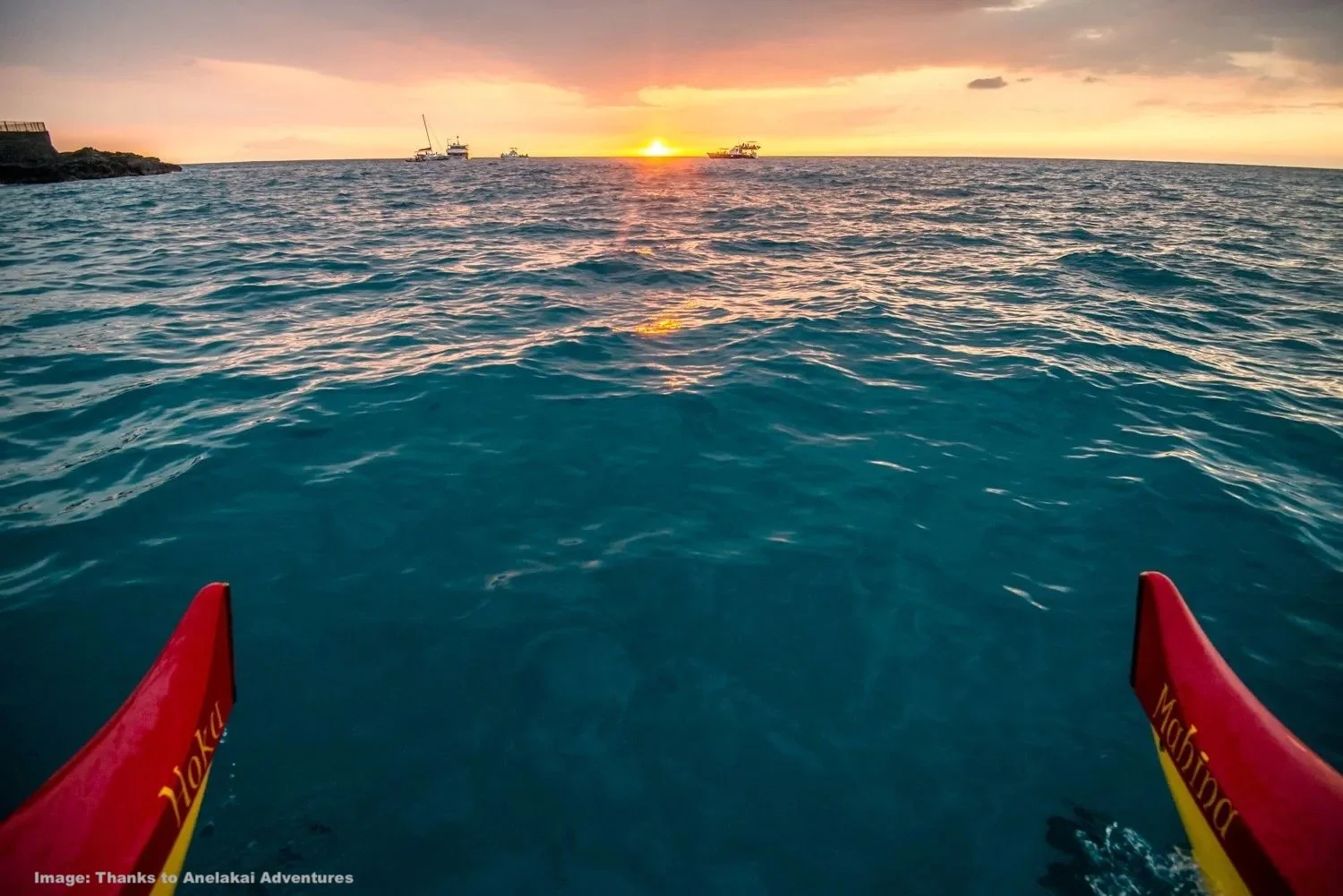 Horizon view from a double-hulled canoe in Hawaii