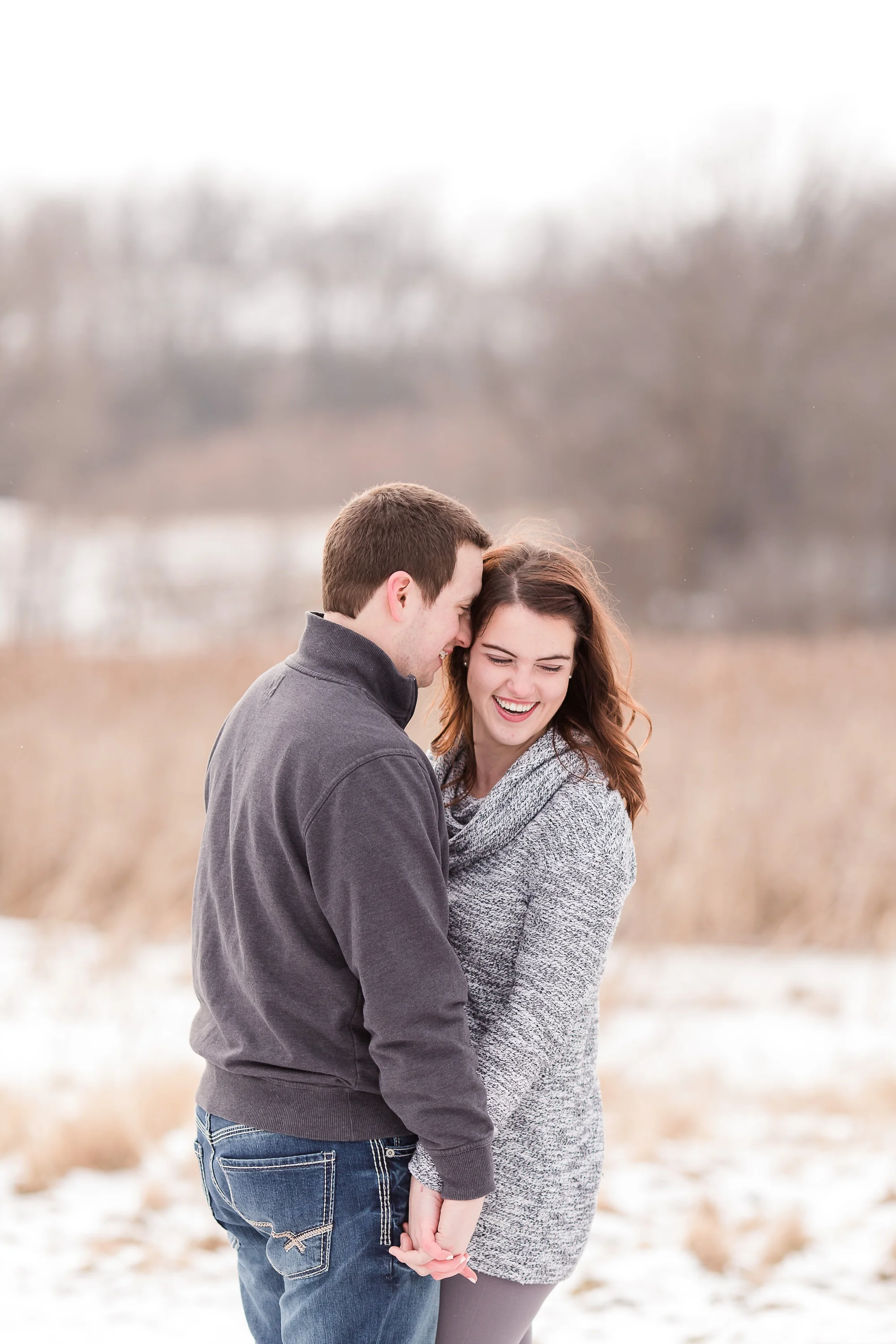 Wintertime, Country Styled Engagement Session with their Dogs near Audubon, MN by Amber Langerud Photography