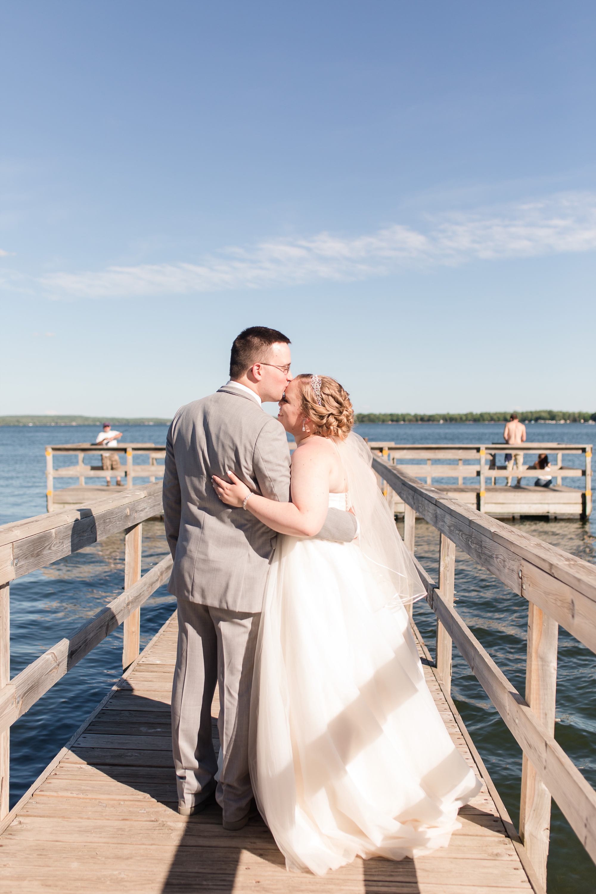 Lake Park Lutheran Church and Holiday Inn Detroit Lakes, Lakeside Wedding by Amber Langerud Photography | Vanessa & Eric