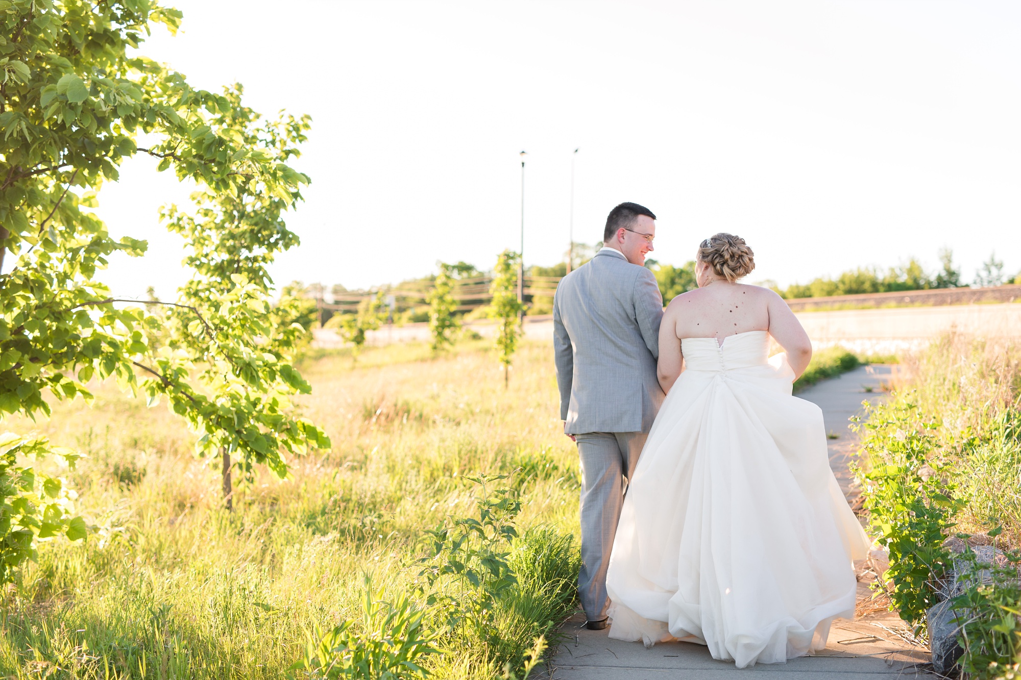 Lake Park Lutheran Church and Holiday Inn Detroit Lakes, Lakeside Wedding by Amber Langerud Photography | Vanessa & Eric