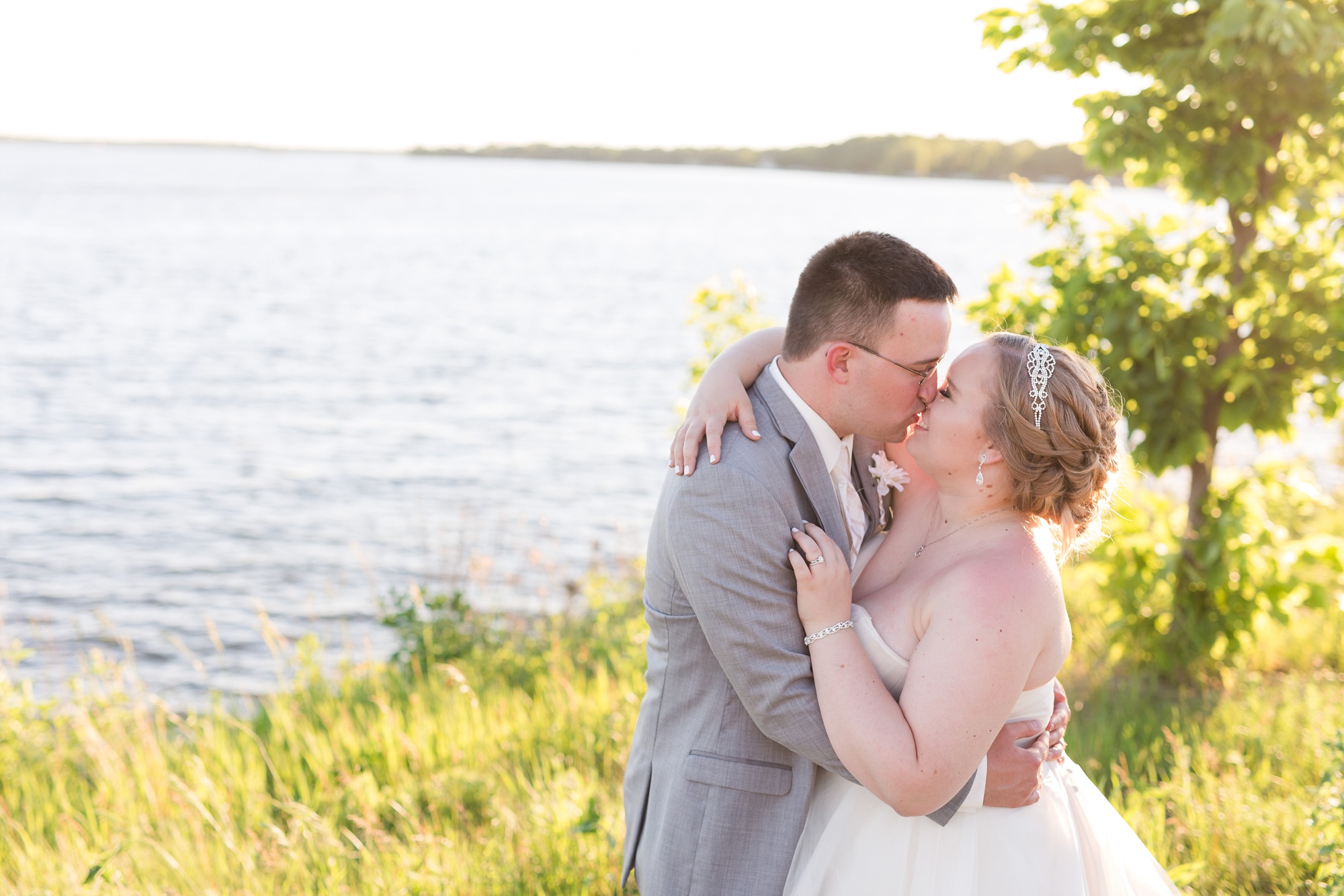 Lake Park Lutheran Church and Holiday Inn Detroit Lakes, Lakeside Wedding by Amber Langerud Photography | Vanessa & Eric