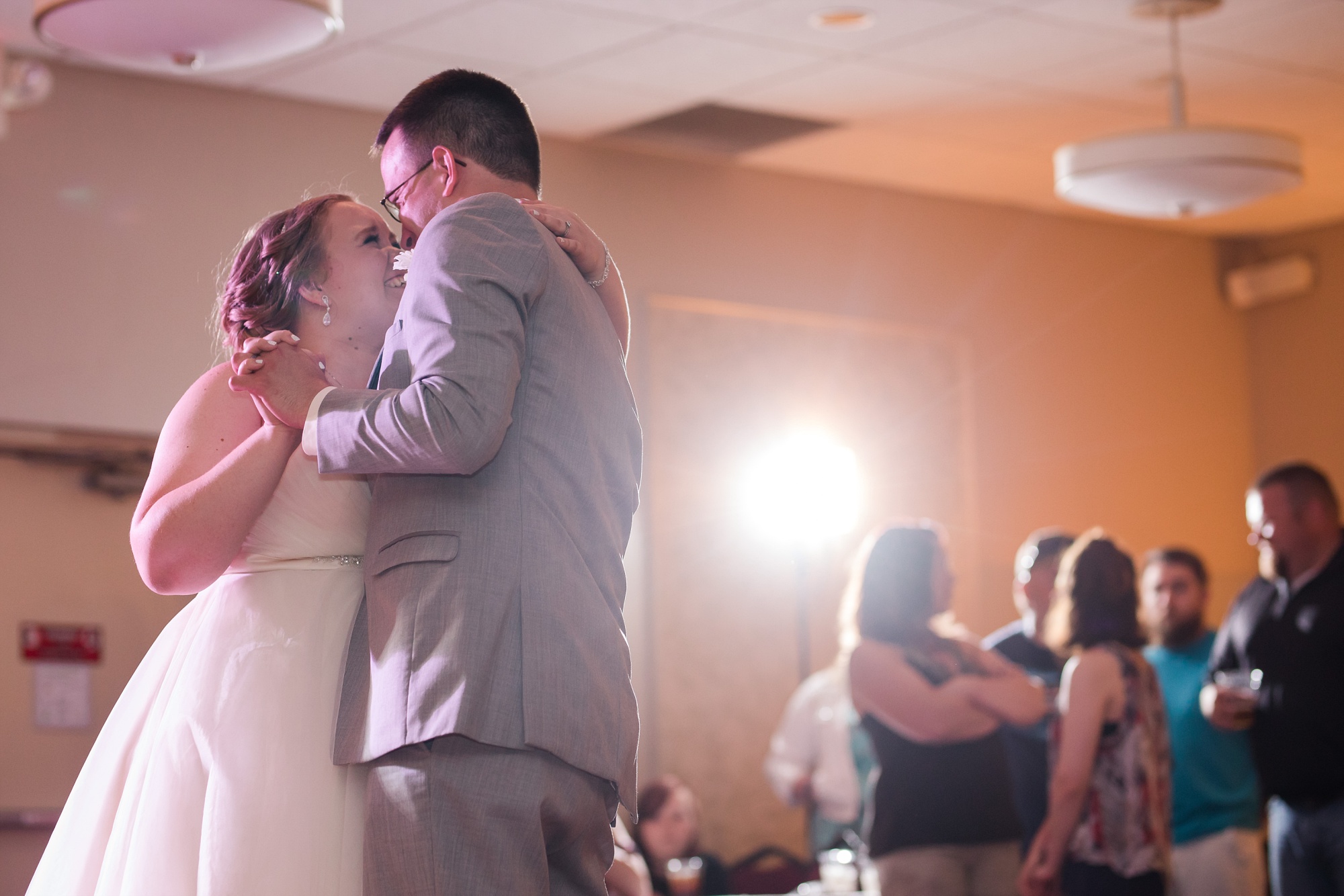 Lake Park Lutheran Church and Holiday Inn Detroit Lakes, Lakeside Wedding by Amber Langerud Photography | Vanessa & Eric
