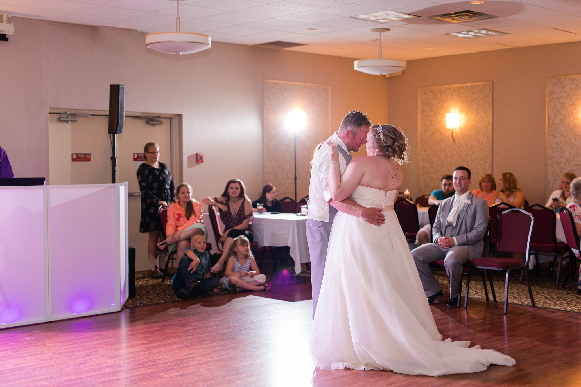 Lake Park Lutheran Church and Holiday Inn Detroit Lakes, Lakeside Wedding by Amber Langerud Photography | Vanessa & Eric