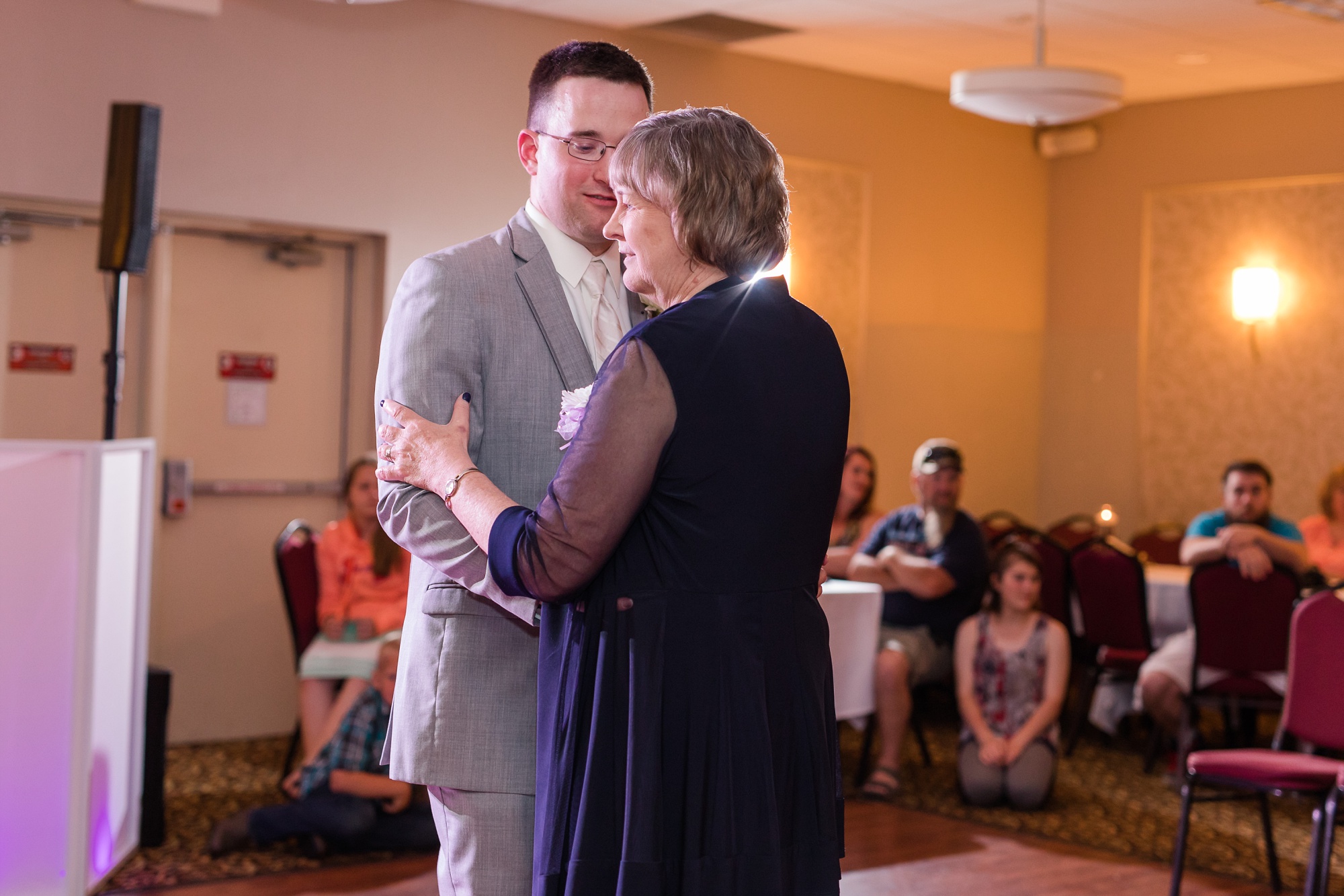 Lake Park Lutheran Church and Holiday Inn Detroit Lakes, Lakeside Wedding by Amber Langerud Photography | Vanessa & Eric