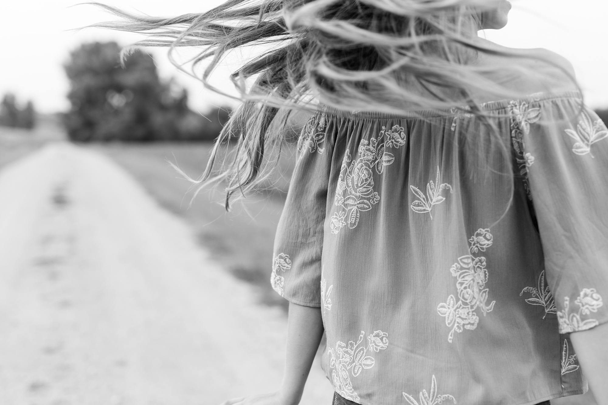 Dance and Country Styled High School Senior Session by Amber Langerud Photography near Audubon on a gravel road | Riley