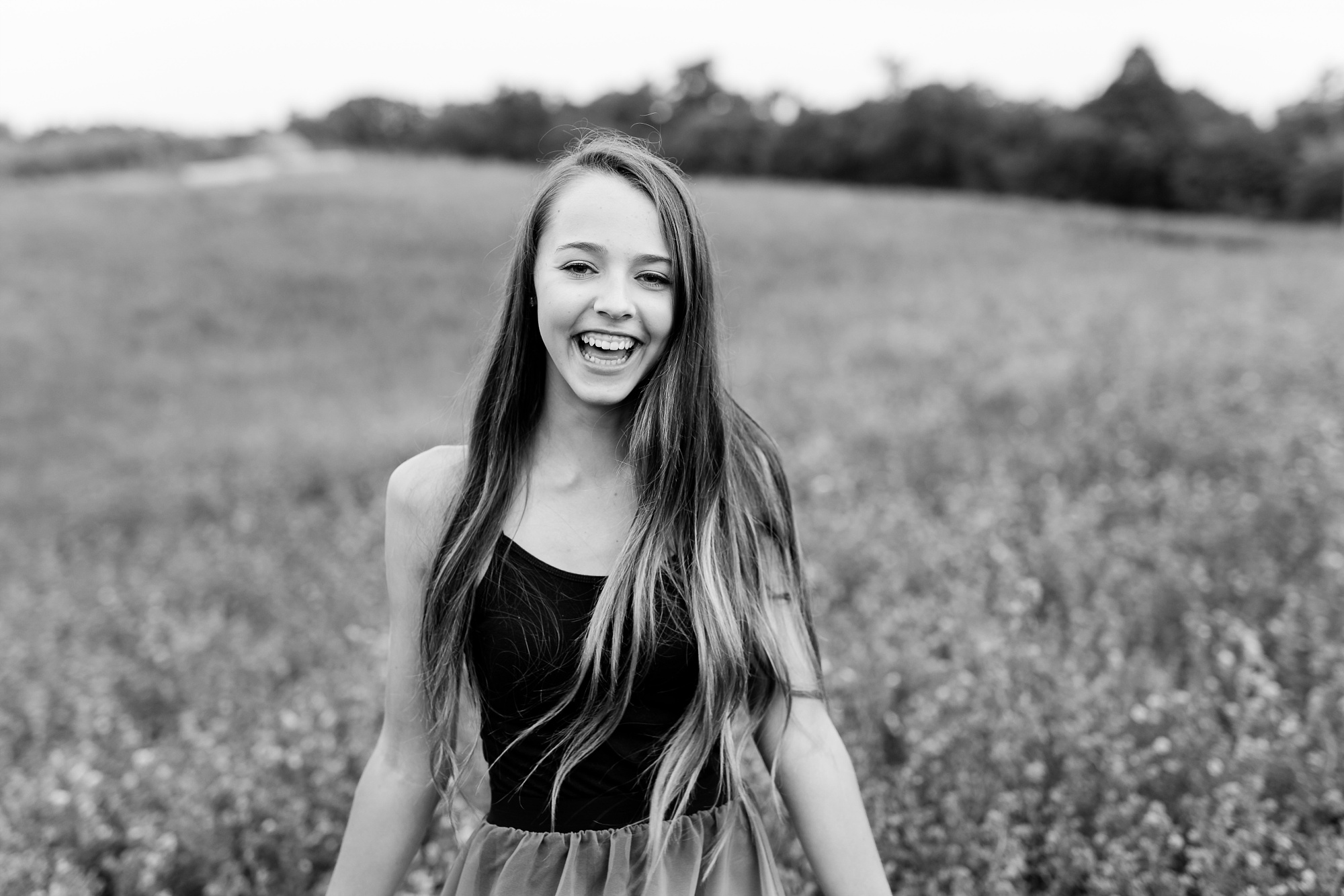 Dance and Country Styled High School Senior Session by Amber Langerud Photography near Audubon in a grassy field | Riley