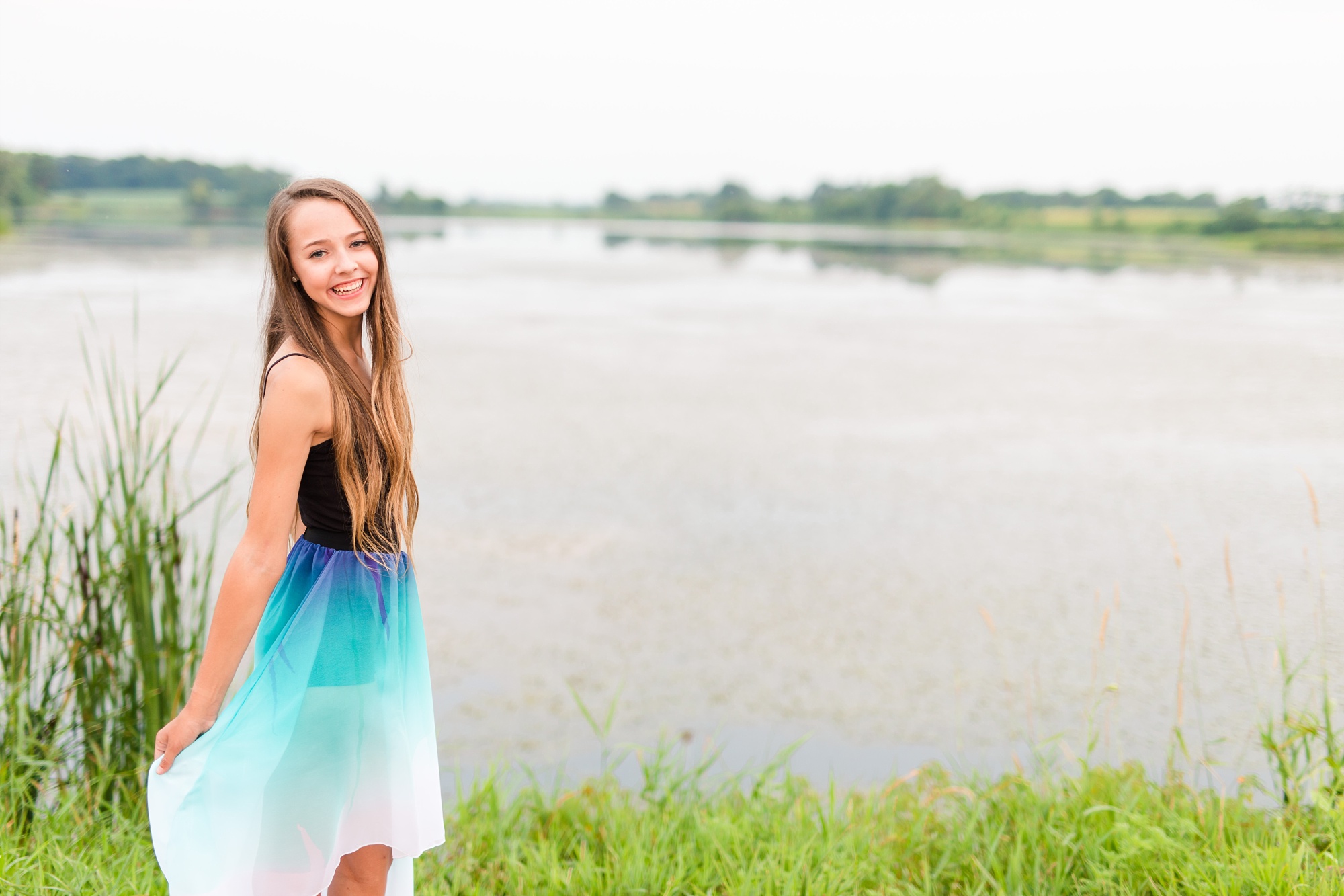 Dance and Country Styled High School Senior Session by Amber Langerud Photography near Audubon in a grassy field | Riley