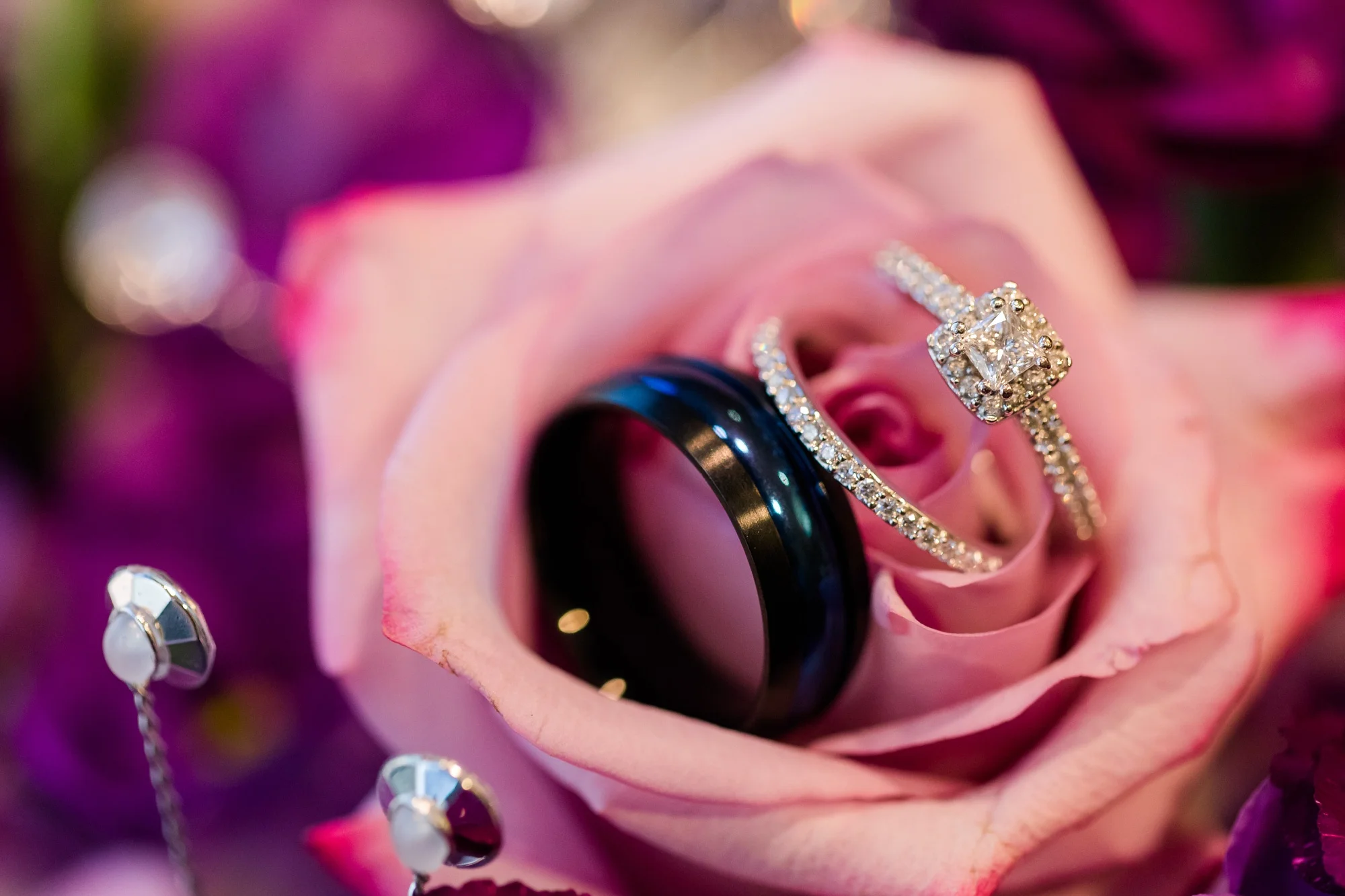 Downtown Fargo Disney Themed Wedding by Amber Langerud Photography | Rings in flowers