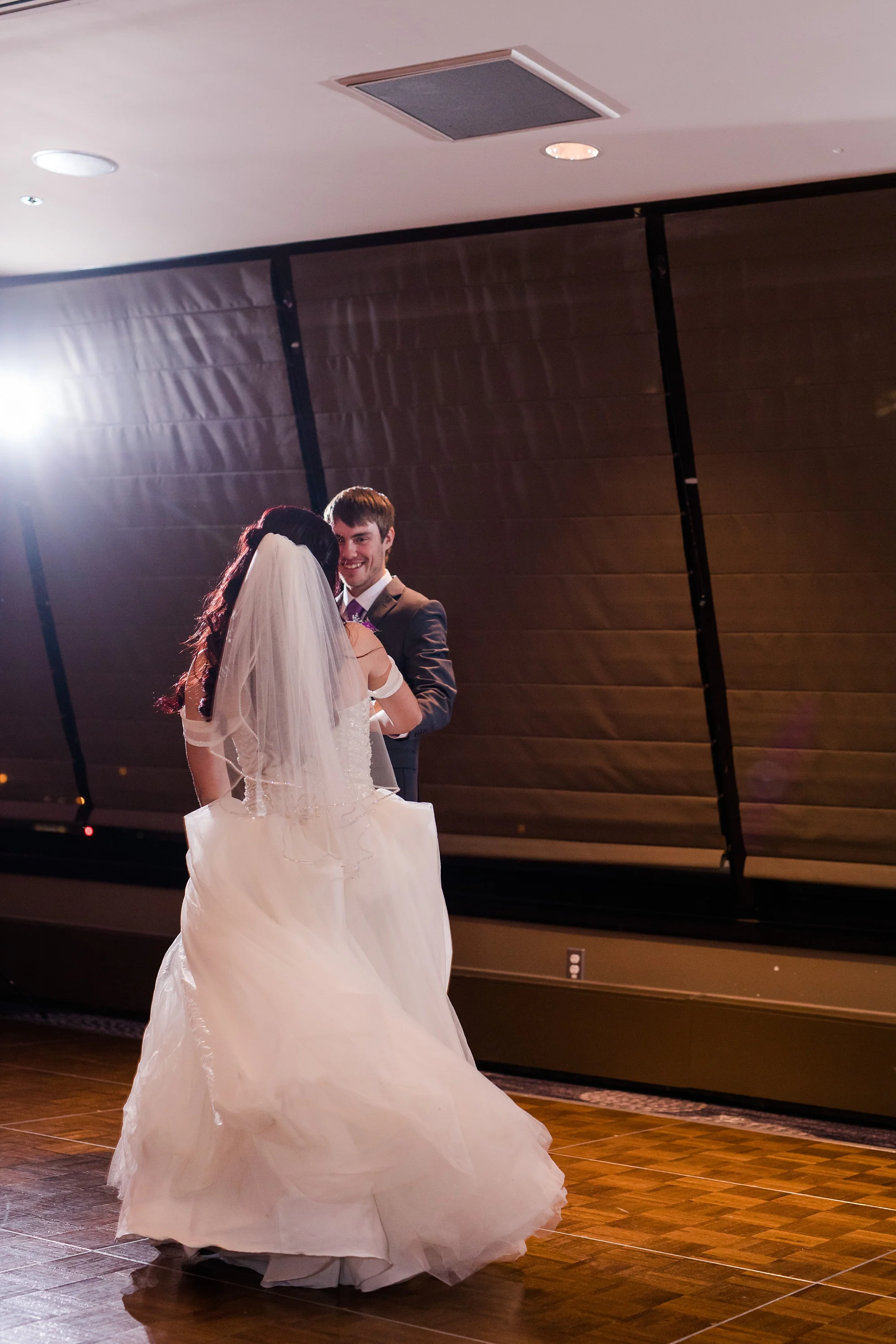 AmberLangerudPhotography_Downtown Fargo, ND Ramada Wedding_3705.jpg