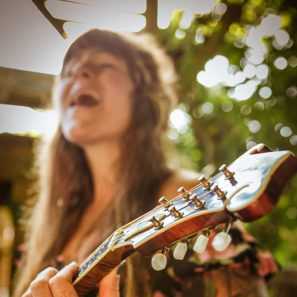 ABOUT THE ARTIST: "You may know Cindy as the lady with the Jethro Burns tattoo. Like her musical hero, she strives to infuse her music with a playful and inventive spirit. Extensive touring and traveling around the US and Europe inspire her diverse musical interests. Lately, the serpentine melodies and infectious rhythms of Brazilian choro and bossa nova occupy a sizable chunk of real estate in her musical landscape. Jazz and songwriting remain vehicles for deepening her understanding of the inner workings of music. To that end, in addition to shows with The Blue Ribbon Healers, Cindy now performs solo, featuring her original material along with some of her favorite jazz and Bossa standards."